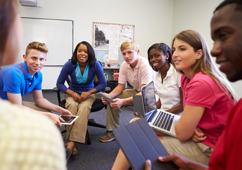 A group of teenagers attend an ASSIST session